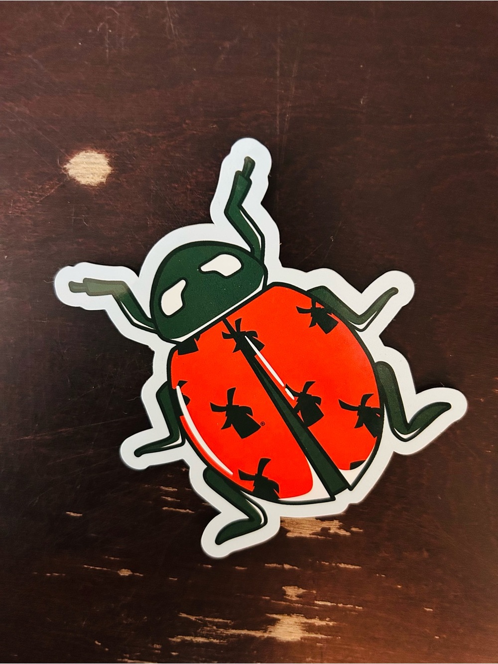 Dutch Bros ladybug sticker